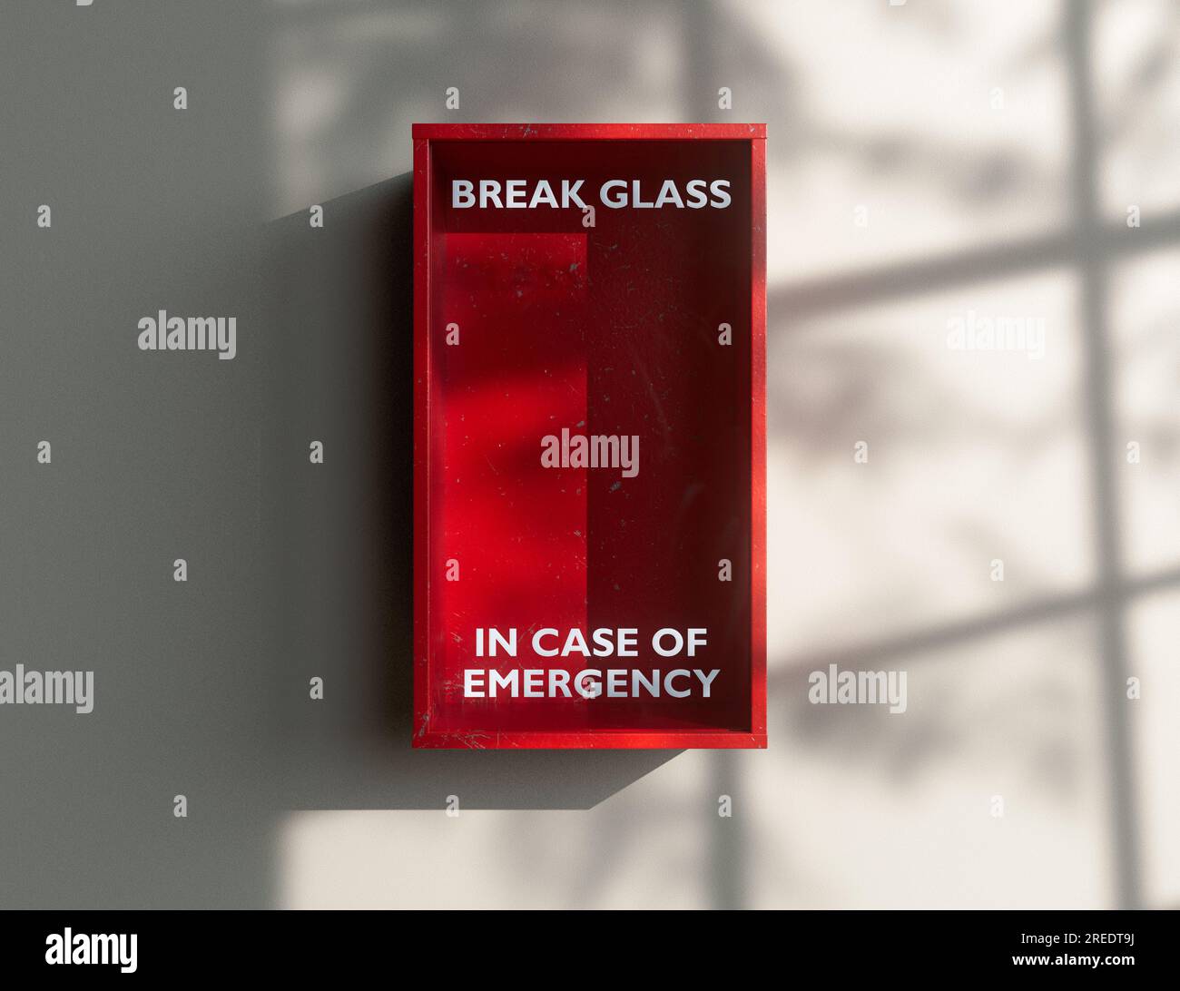 An empty red emergency box with an in case of emergency breakable glass on the front mounted on a wall - 3D render Stock Photo