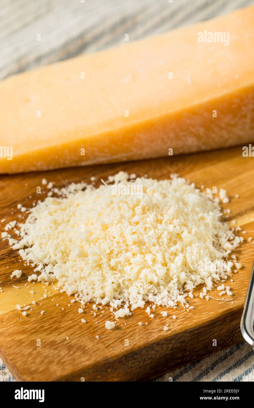 Organic White Grated Parmesan Cheese in a Pile Stock Photo Alamy