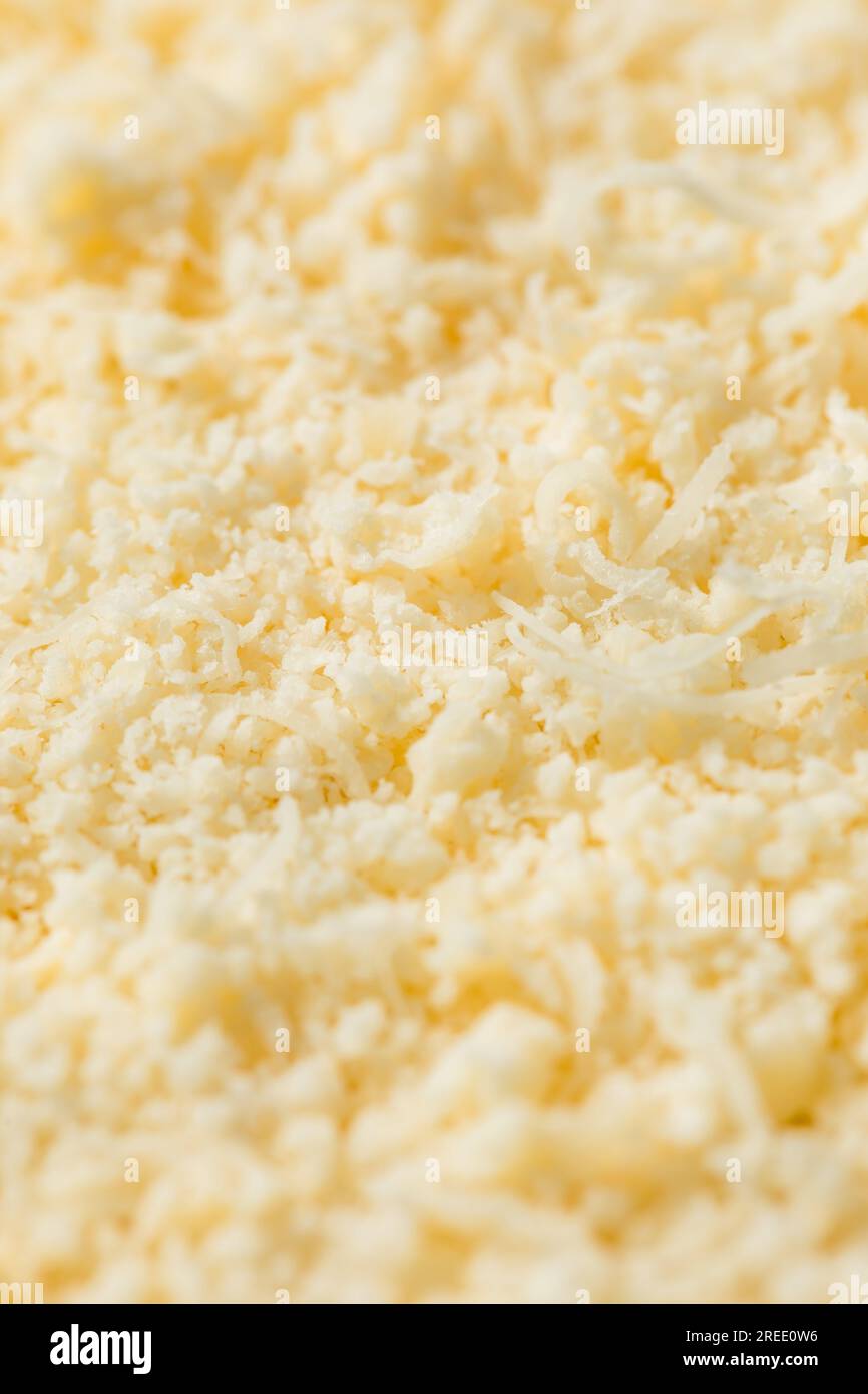 Organic White Grated Parmesan Cheese in a Pile Stock Photo - Alamy