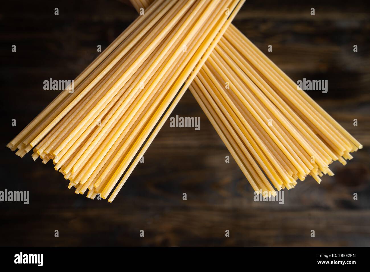 Spaghetti Stack Raw uncooked Italian spaghetti , two stacks of pasta crossed over a ...