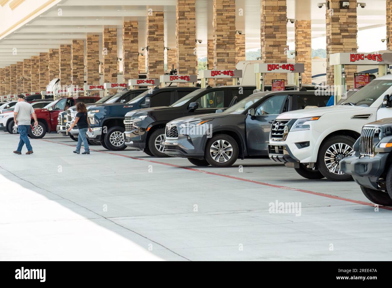 Sevierville, Tennessee, United States – July 24, 2023:  A steady line of vehicles fuel up at a newly opened Buc-ees. Stock Photo