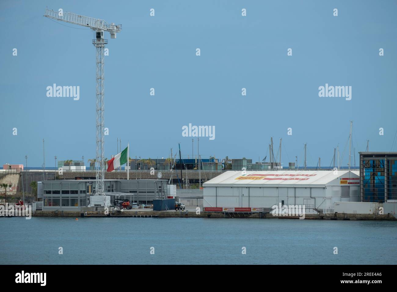 Barcelona, Spain. 26th July, 2023. The nautical pavilion of the Luna Rossa Prada Pirelli team is seen installed in the port of Barcelona. The facilities of the American's Cup Barcelona sailing competition begin to be visible in the port of Barcelona. Some of the nautical bases of the teams that will participate in the most important sailing competition sport already display the flags of their countries. Some teams even already train in the waters of the port of Barcelona. Credit: SOPA Images Limited/Alamy Live News Stock Photo