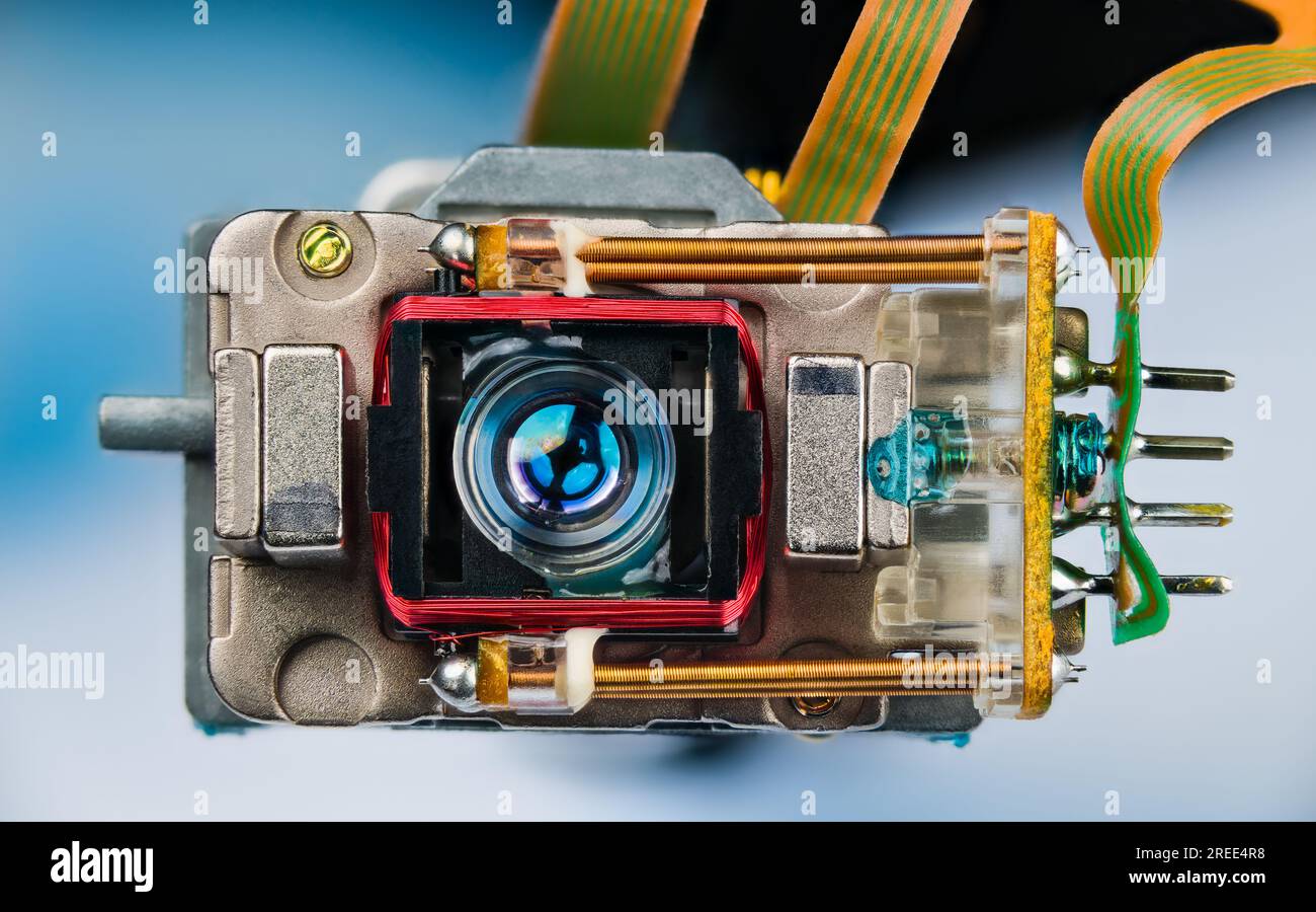 Closeup a small lens of optical readwrite head with connection of