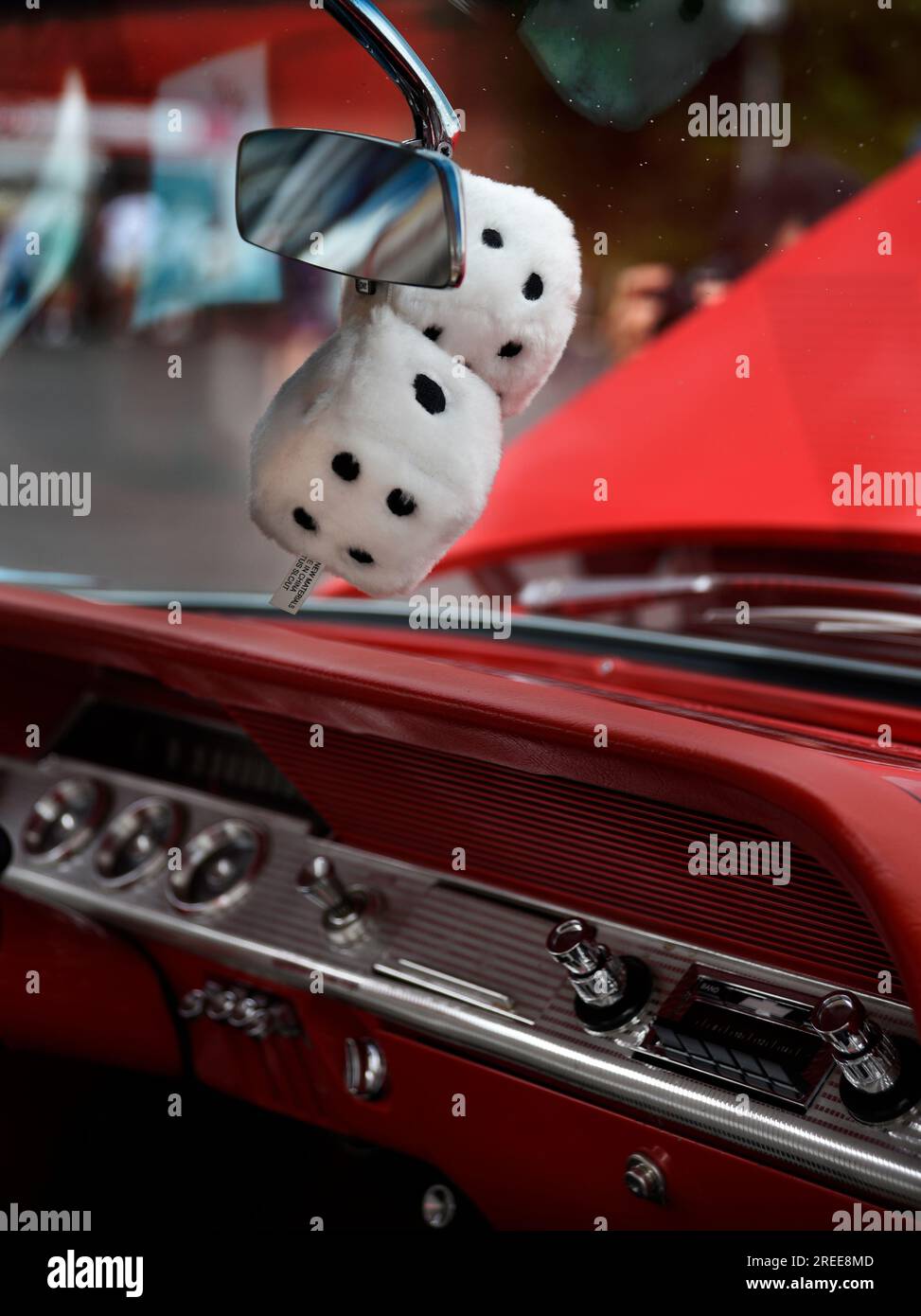 Fuzzy Dice On The Rearview Mirror Dashboard Fur Chrome Photo