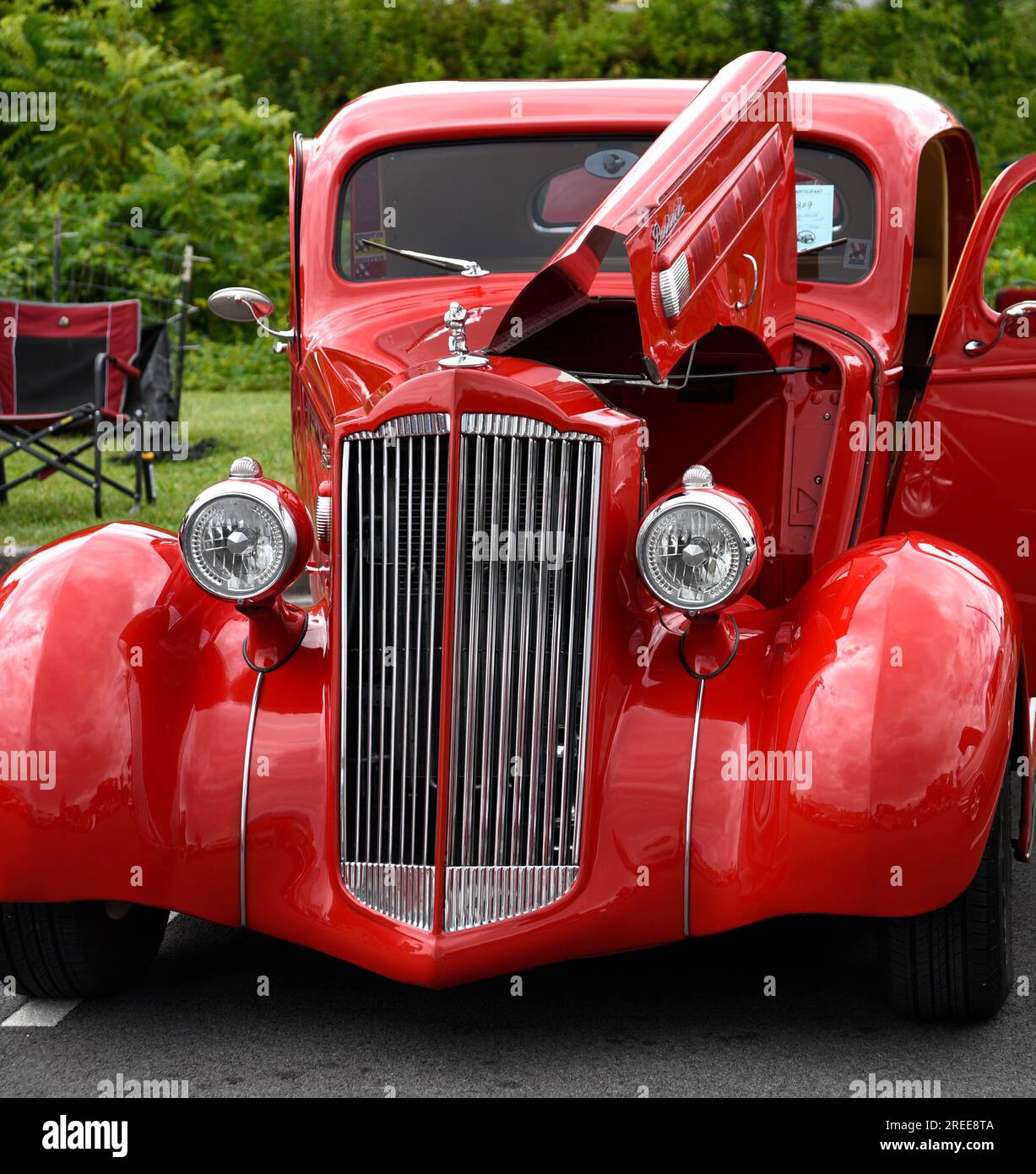 A customized 1937 Packard automobile on display at an antique and custom car show in Abingdon
