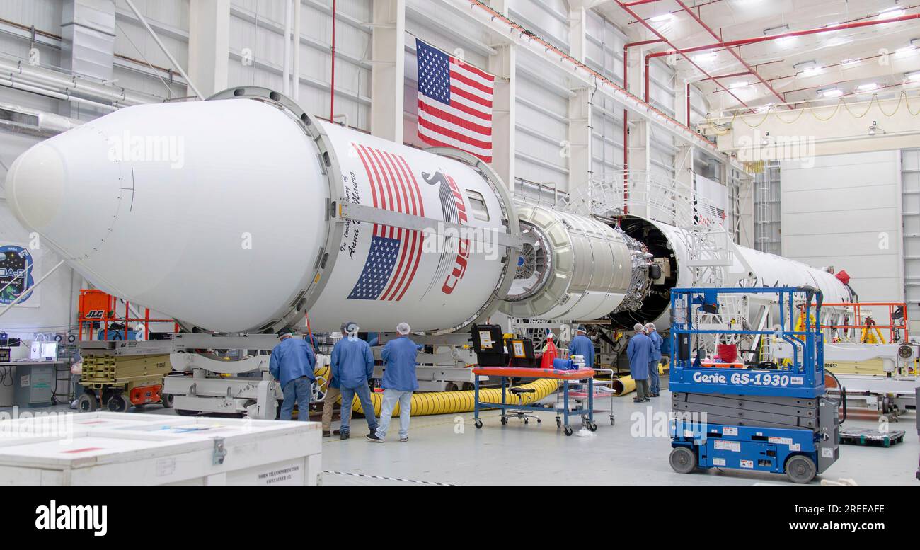 Wallops Island, United States of America. 26 July, 2023. Technicians attach the fairing to the Northrop Grumman Antares rocket carrying the unmanned Cygnus spacecraft at the Horizontal Integration Facility of the Mid-Atlantic Regional Spaceport of the NASA Wallops Flight Facility, July 26, 2023 in Wallops Island, Virginia, USA. The spacecraft will launch August 1st with 8,200 pounds of supplies for the International Space Station. Credit: Danielle Johnson/NASA/Alamy Live News Stock Photo