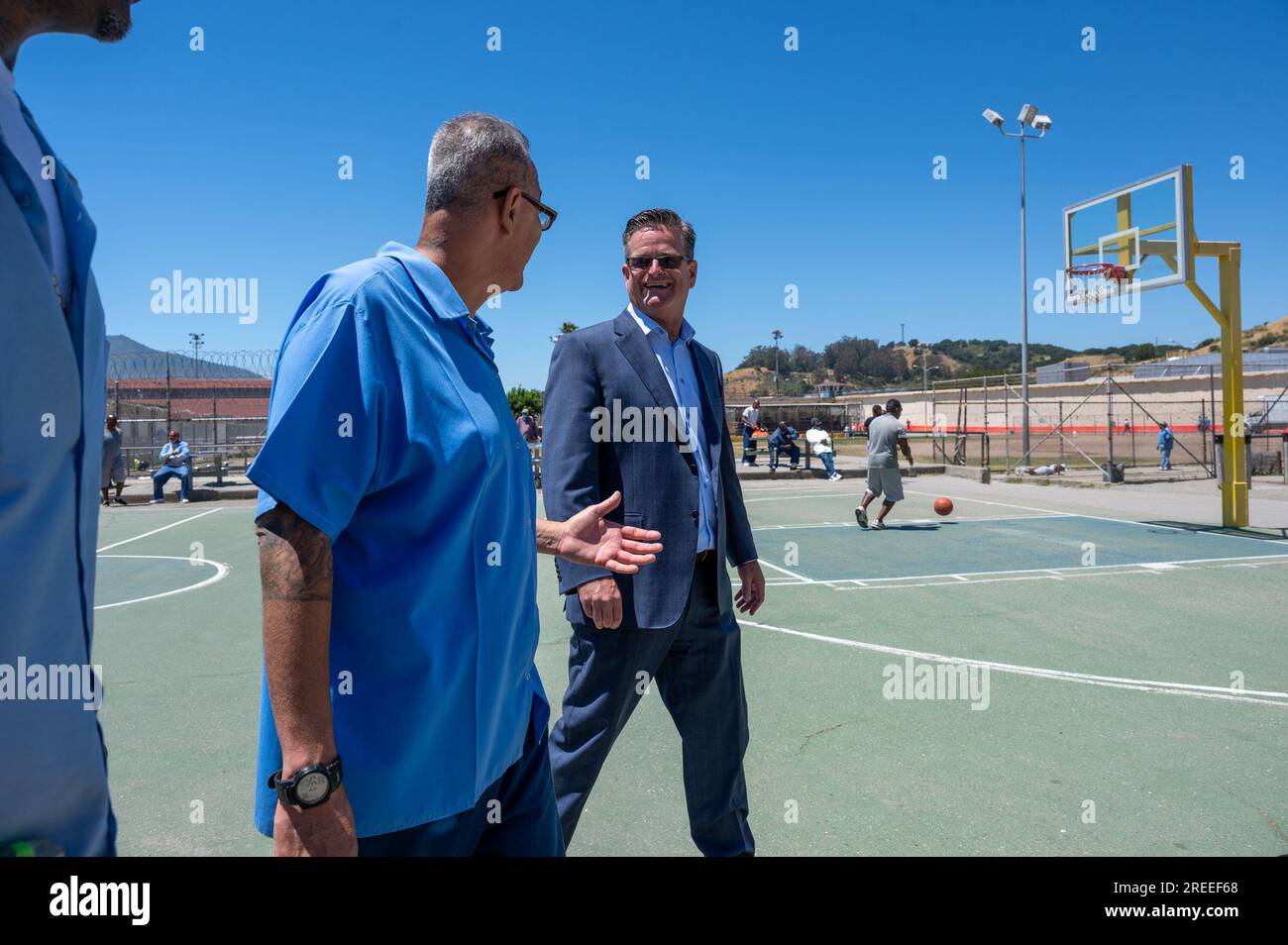 San Rafael, CA, USA. 26th July, 2023. Warden Ron Broomfield walks the yard and talks with inmates at San Quentin State Prison Wednesday, July 26, 2023 in San Rafael. CDCR is offering a tour of San Quentin State Prison to highlight how the facility's rehabilitation and education programs improve public safety. In March of 2023, Governor Newsom announced California intends to transform the prison into the San Quentin Rehabilitation Center. The transformation is being guided by a team of correctional, reentry, and rehabilitation experts. Visitors can expect a tour of the chapel, the Last Mile Stock Photo