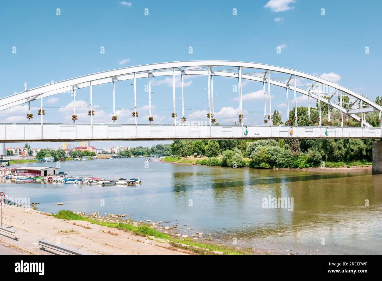 The Belvárosi Bridge in Szeged, Hungary,is the main bridge of the city, connecting Újszeged,on the left bank of the river Tisza,to the other quarters. Stock Photo