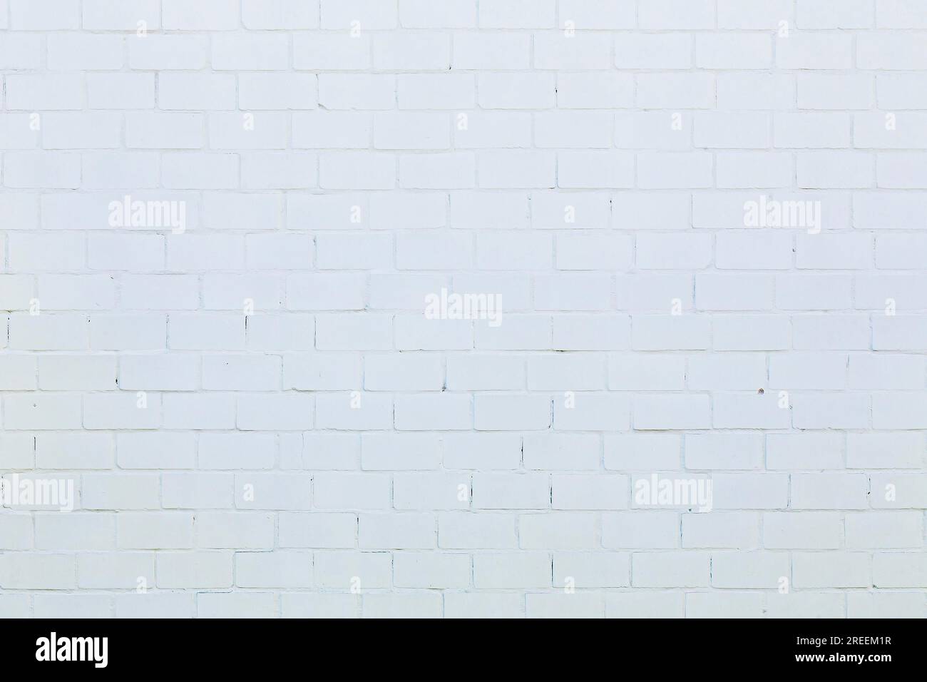 Simple white brick wall for backgrounds Stock Photo