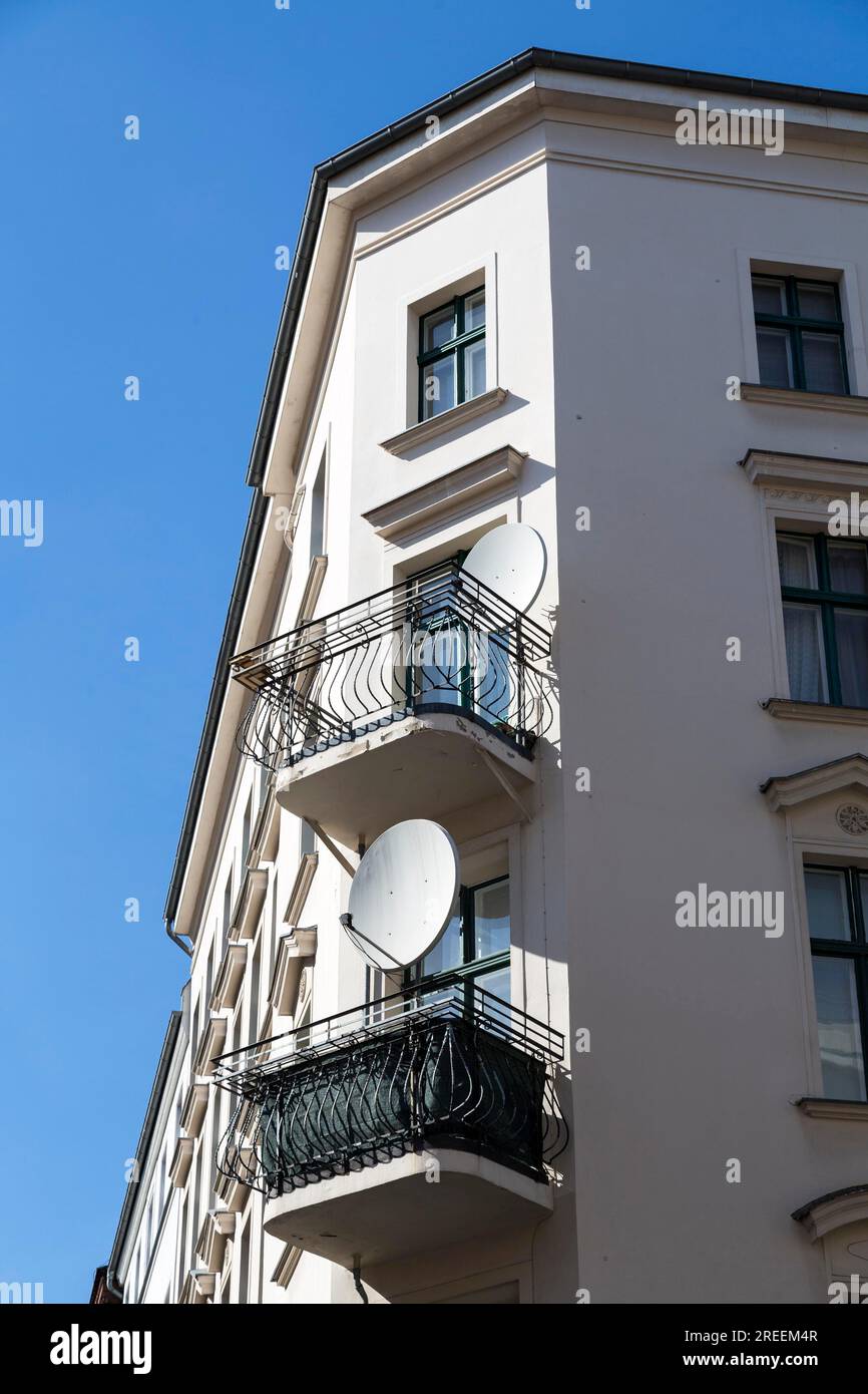 Balconies with satellite dishes, Berlin Kreuzberg Stock Photo
