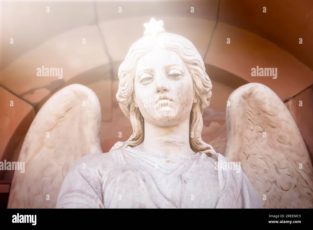 Marble sculpture of an angel with a star on his head. Unknown artist of the 19th century Stock Photo
