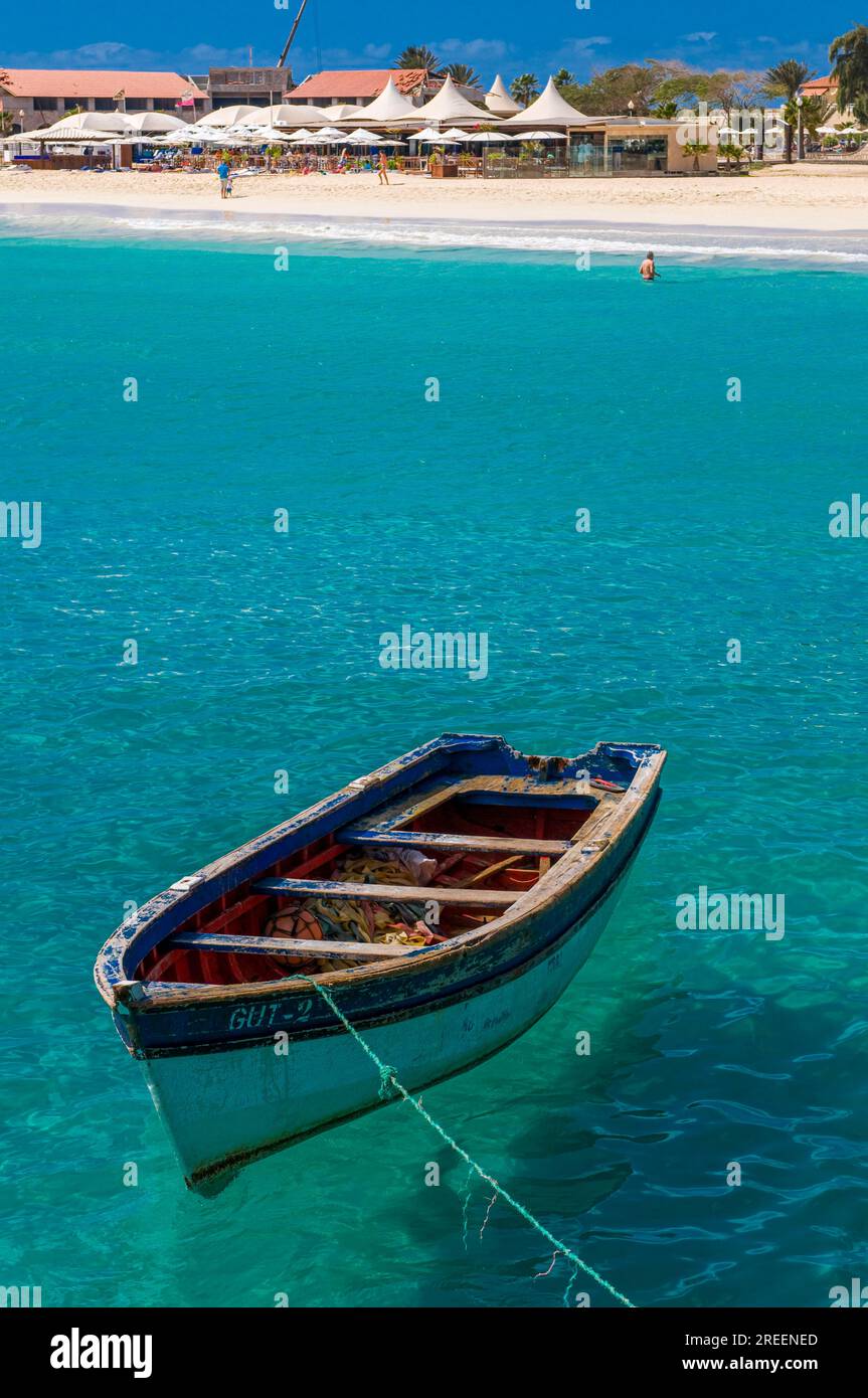 Rowboat in blue sea at coast. Santa Maria. Sal. Cabo Verde. Africa Stock Photo
