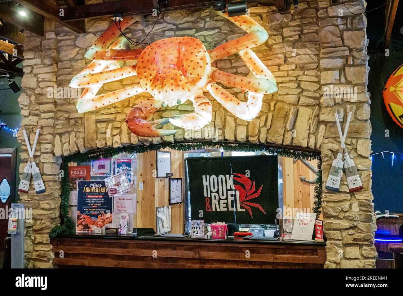 Athens Georgia,Hook & Reel Cajun Seafood and Bar restaurant,inside interior indoors,giant king crab Stock Photo