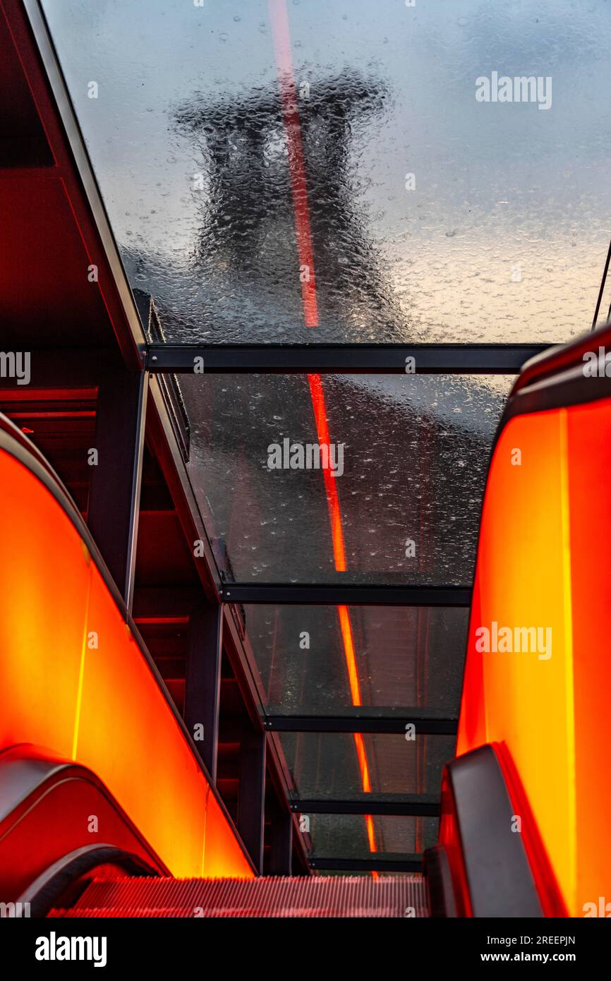 Zollverein colliery, rainy day, riding the escalator of the Ruhr Museum, in the coal washing plant, looking at the double trestle winding tower of sha Stock Photo