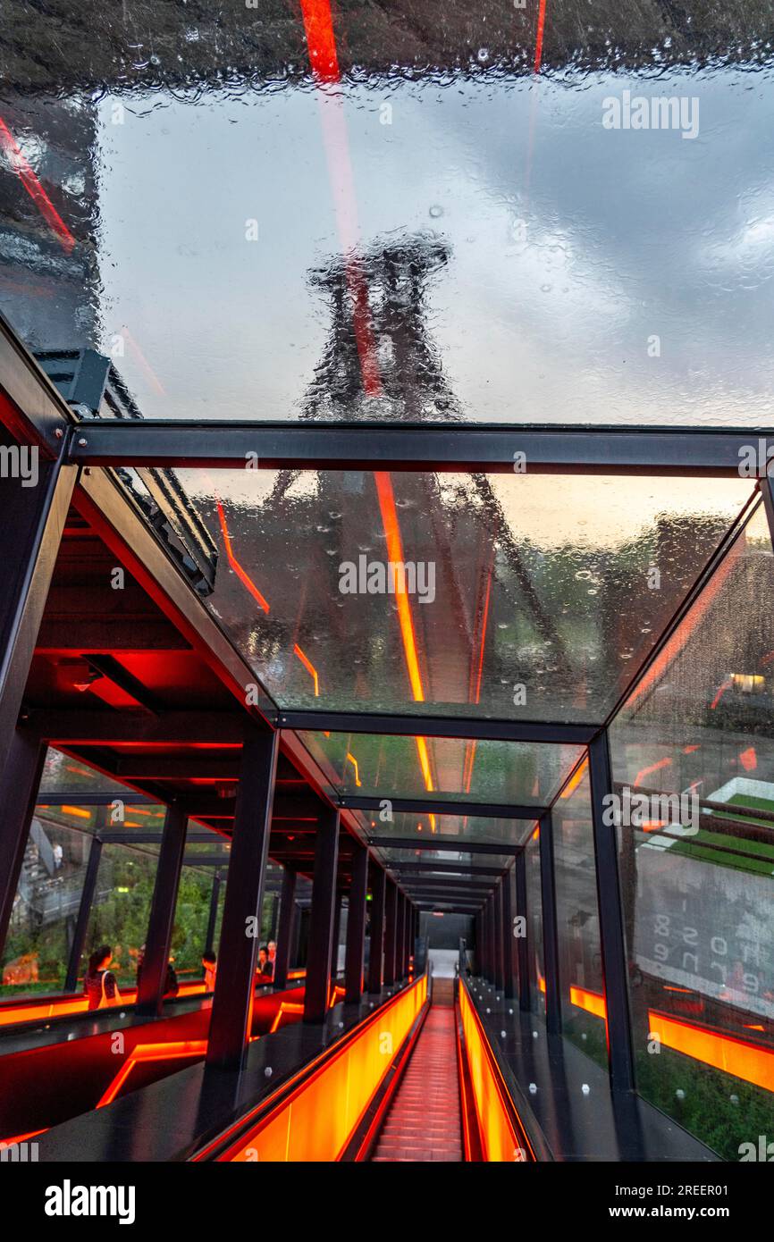 Zollverein colliery, rainy day, riding the escalator of the Ruhr Museum, in the coal washing plant, looking at the double trestle winding tower of sha Stock Photo