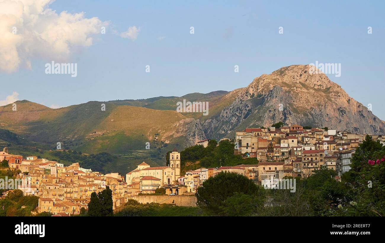 Evening light, mountain, village on hill, Militello Rosmarino, village, Nebrodi National Park, Sicily, Italy Stock Photo