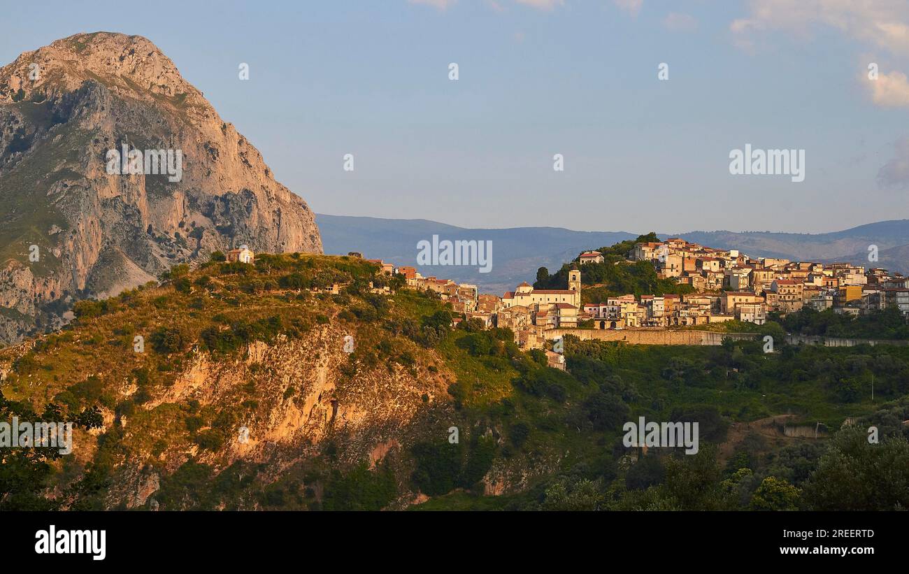 Evening light, mountain, village on hill, Militello Rosmarino, village, Nebrodi National Park, Sicily, Italy Stock Photo