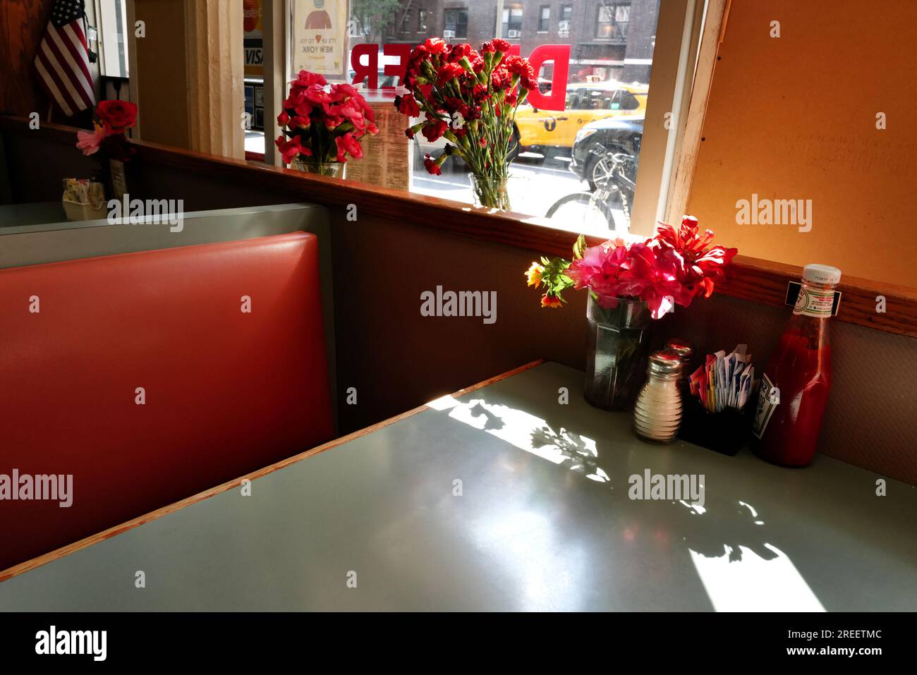 Booth and interior of a classic American diner in New York City Stock Photo