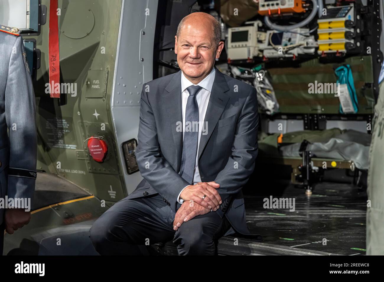 German Chancellor Olaf Scholz sits in a Bundeswehr NH90 helicopter, International Aerospace Exhibition, ILA Berlin Air Show, Schoenefeld Stock Photo