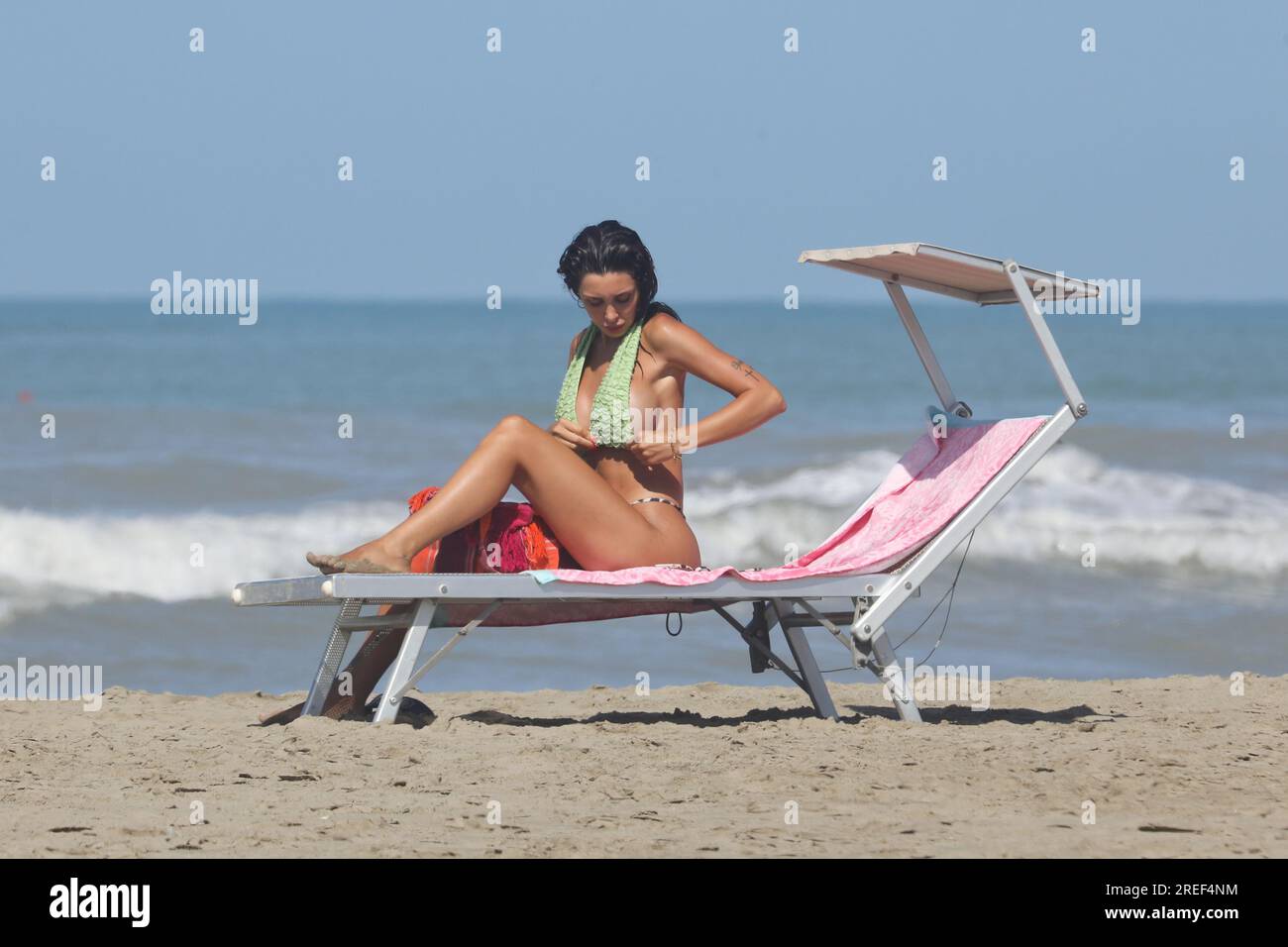 Sabaudia, Italy. 27th July, 2023. Sabaudia (LT), dizzying curves those of the former Pupa, Martina Di Maria, which we see in the images on the beach of the Pontine coast. Back single after breaking up with ex GF Alessandro Calabrese, Di Maria will return to TV in the Canale 5 program 'Ciao Darwin 9'. In fact, he will be part of the fixed cast of 'A spasso nel tempo'. Credit: Independent Photo Agency/Alamy Live News Stock Photo