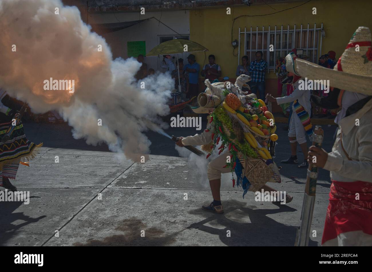 carnival in Huejotzingo Puebla Mexico. People leave their houses characterized as 'French' and natives of Puebla to perform the representation of the Battle of Puebla. This confrontation is carried out with rifles where inside there are gunpowder charges that, when activated, cause a loud explosion. These festivities are also related to asking for rain and a good harvest, the roar of the rifles represents the sound that the sky makes when it announces a storm. March 2019. © (© Fernando Camacho/ Norte Photo)  carnavalen  Huejotzingo Puebla Mexico. La gente sale de sus casas caracterizados como Stock Photo