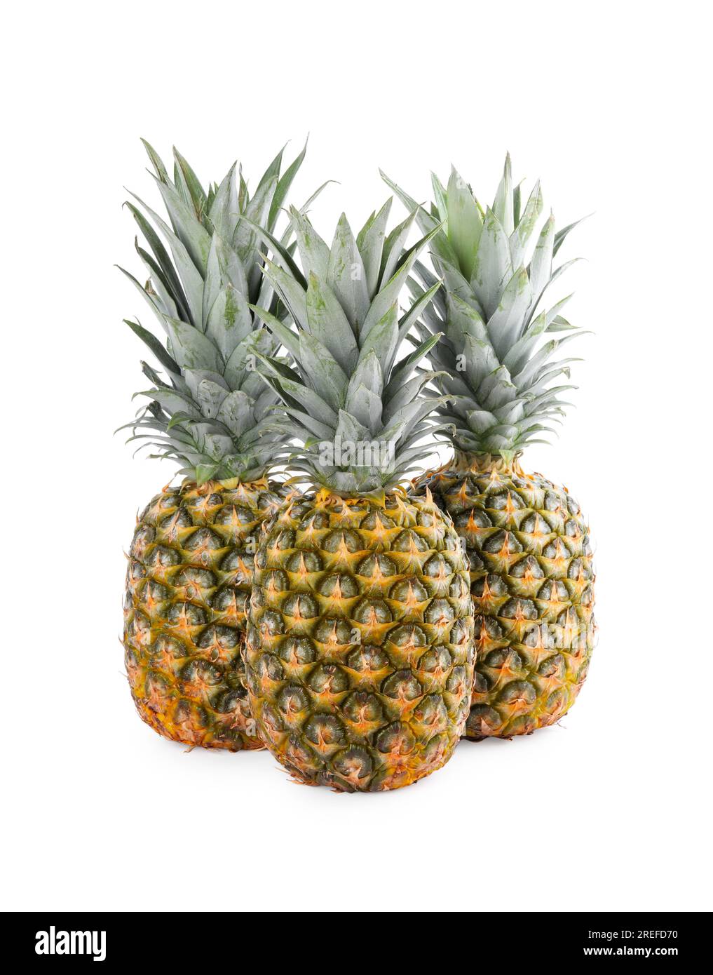 Three delicious ripe pineapples on white background Stock Photo