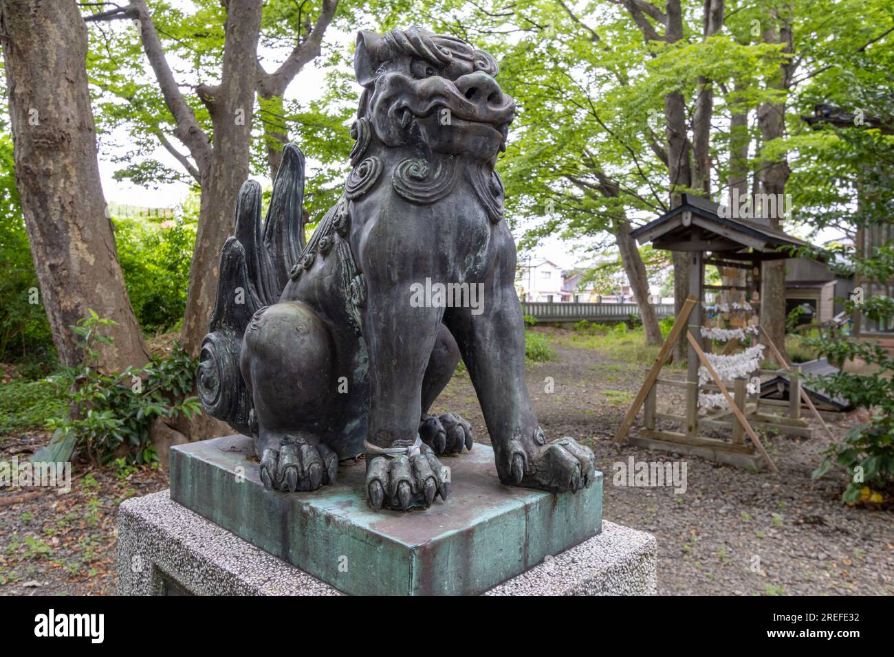 Komainu, or liondog, statue at Kasuga jinja shinto shrine, Kanazawa