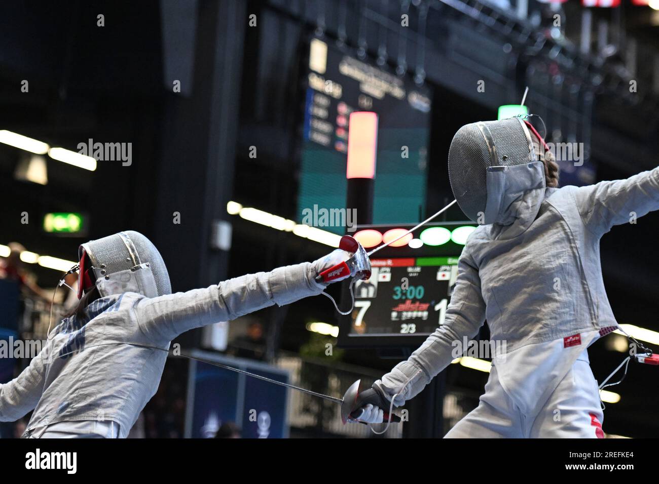 Risa Takashima of Japan (L) fights against Misaki Emura of Japan during