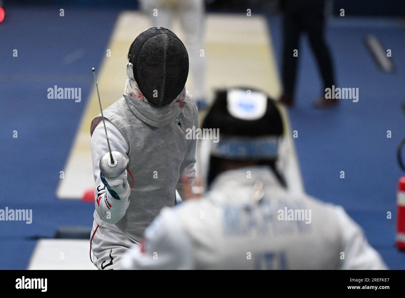 Takahiro Shikine of Japan (L) fights against Tommaso Marini of Italy
