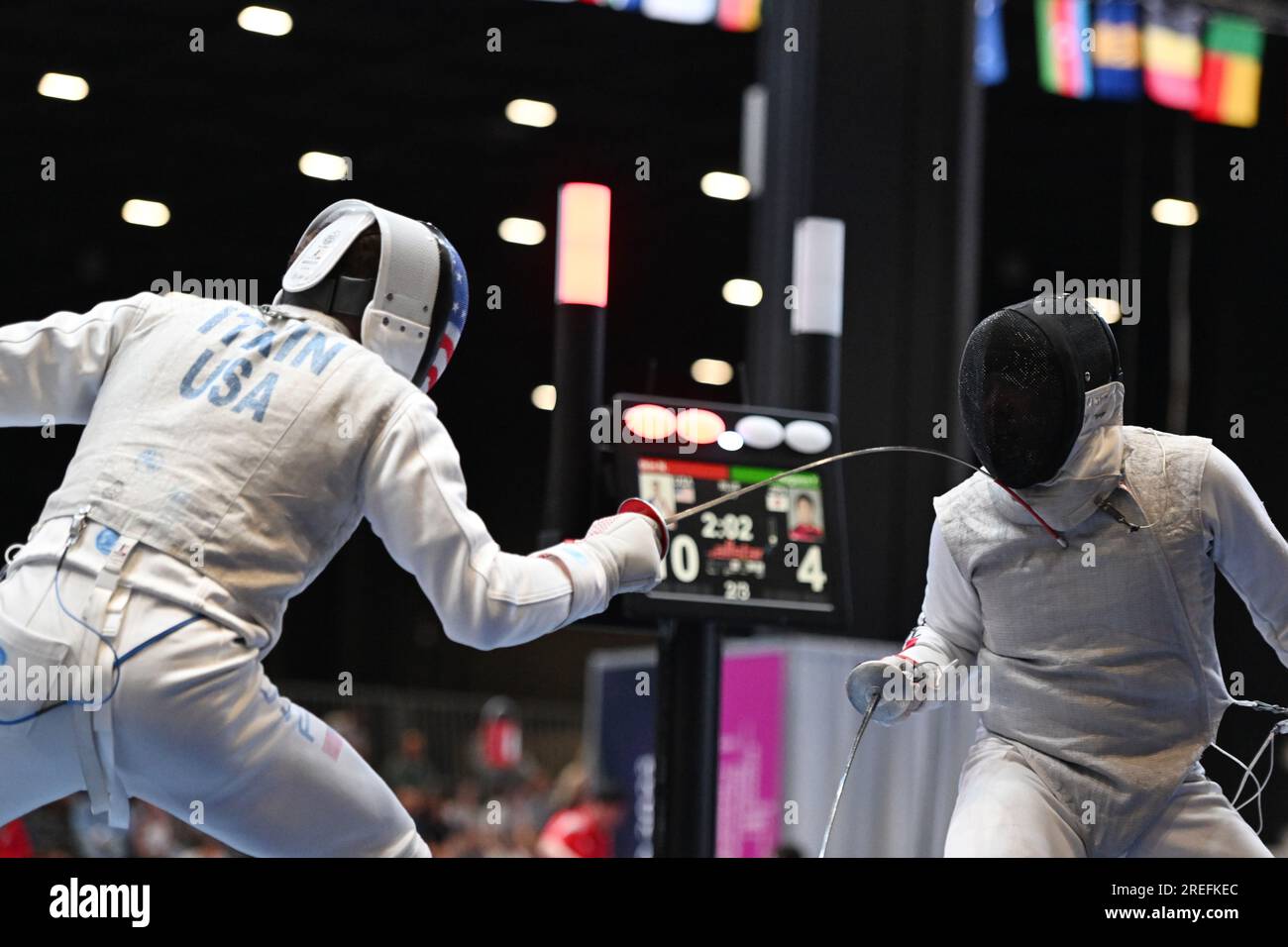 Yudai Nagano of Japan (R) fights against Nick Itkin of United States