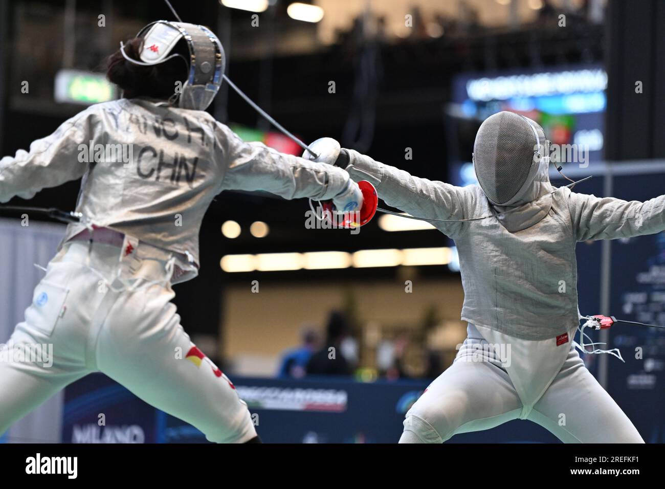 Seri Ozaki of Japan (R) fights against Yang Hengyu of China during the