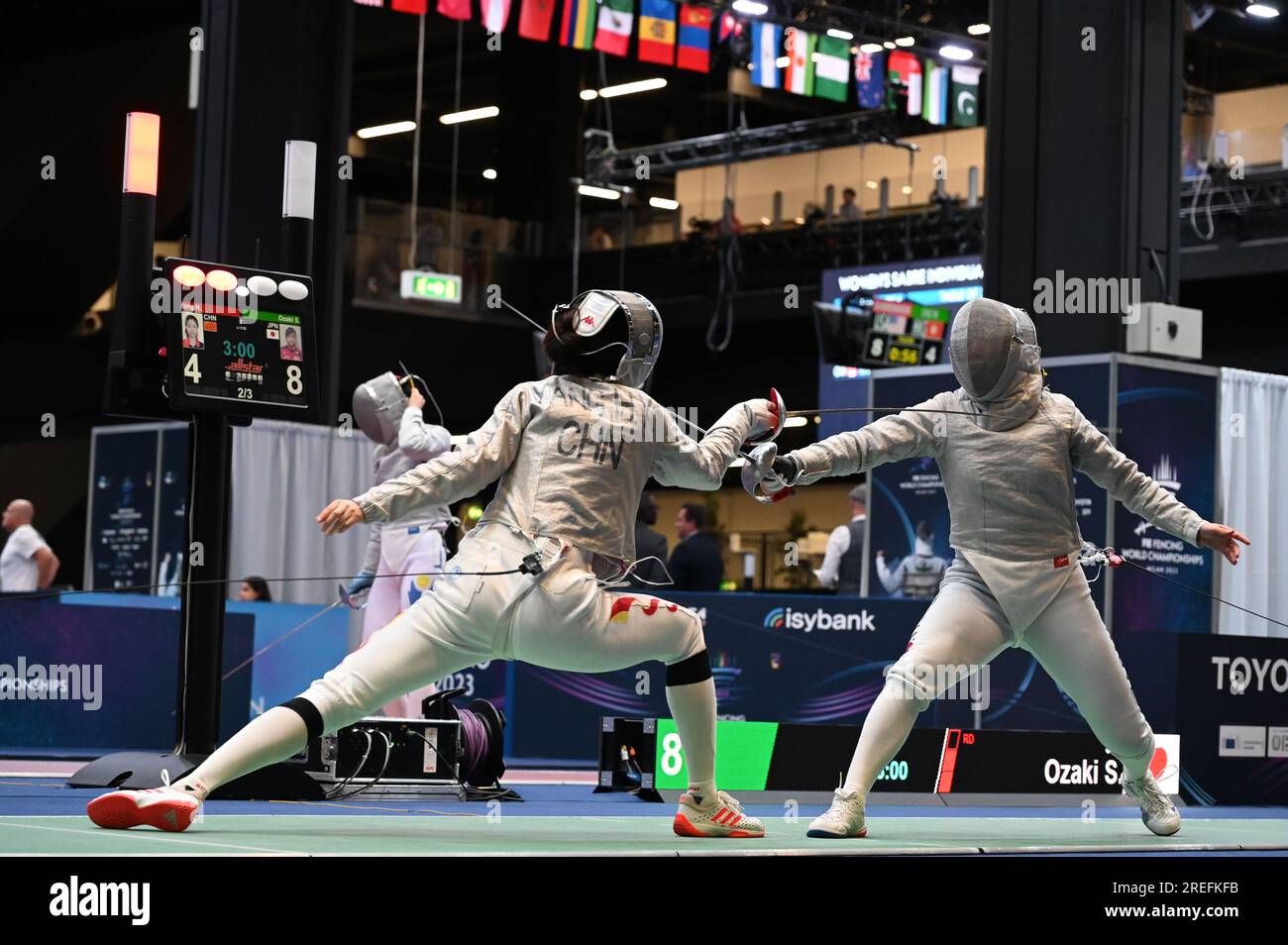 Seri Ozaki of Japan (R) fights against Yang Hengyu of China during the