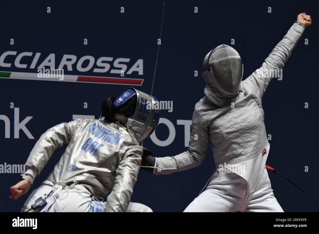 Misaki Emura of Japan (R) fights against Theodora Gkountoura of Greece