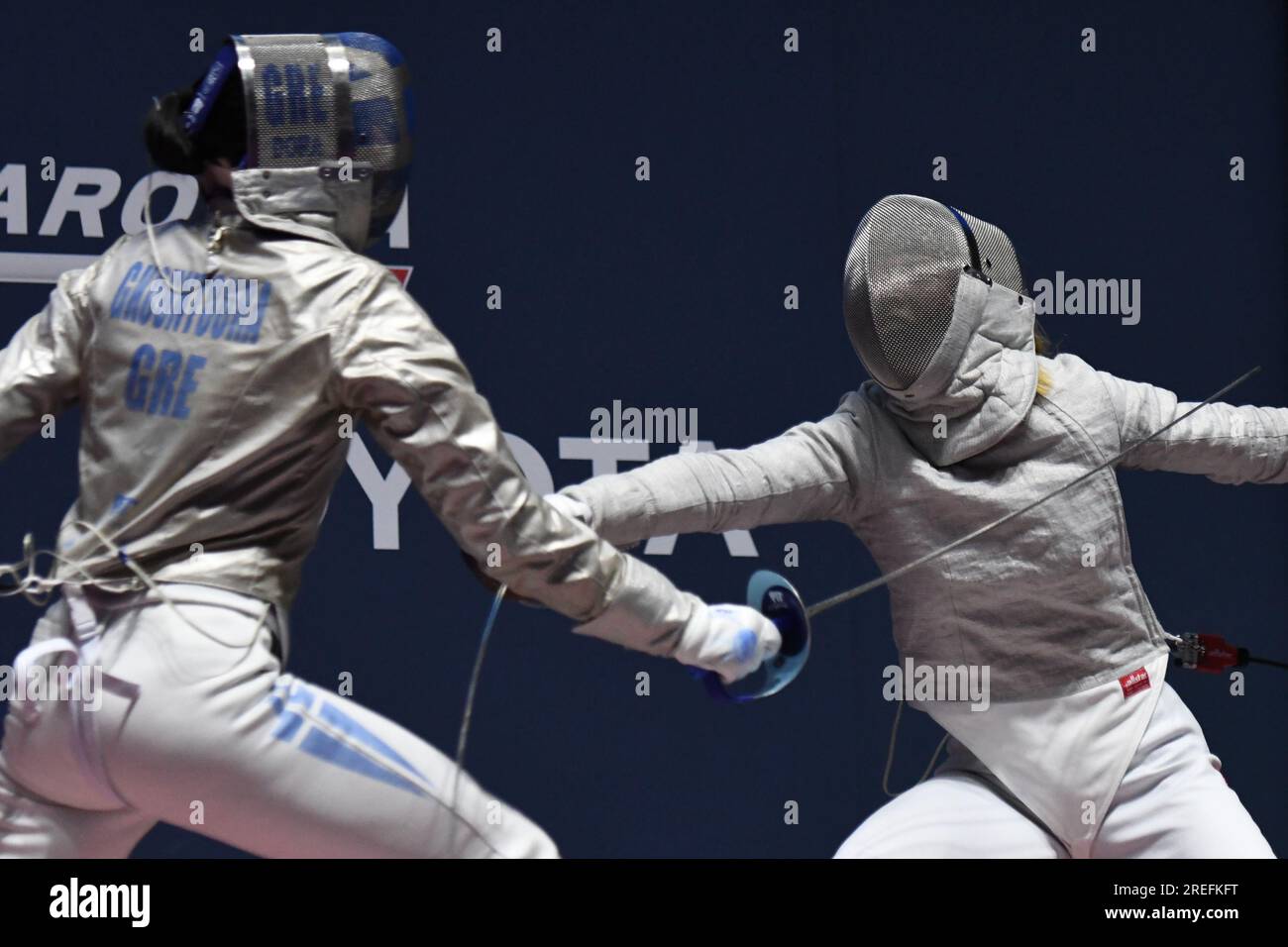 Misaki Emura of Japan (R) fights against Theodora Gkountoura of Greece