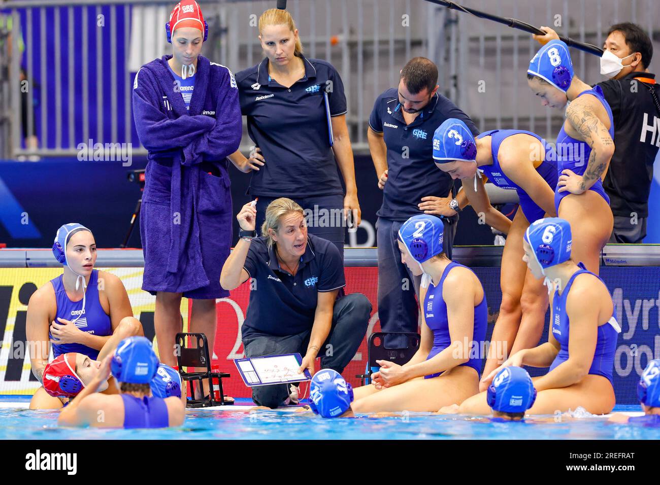 FUKUOKA, JAPAN - JULY 28: time out greece with headcoach Alexia Anna Kammenou of Greece, Chrysoula Diamantopoulou of Greece, Eleftheria Plevritou of Greece, Ioanna Chydirioti of Greece, Nikoleta Eleftheriadou of Greece, Eleni Xenaki of Greece, Eirini Ninou of Greece, Eleni Elliniadi of Greece, Christina Siouti of Greece, Athina Dimitra Giannopoulou of Greece, Maria Myriokefalitaki of Greece, Ioanna Stamatopoulou of Greece, Foteini Tricha of Greece, Eleftheria Fountotou of Greece during the World Aquatics Championships 2023 Women's Waterpolo Classification 7th-8th place match between Canada and Stock Photo