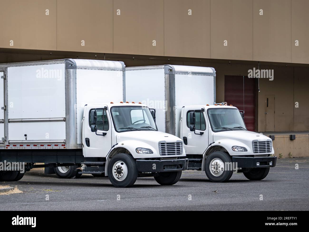 Two Industrial standard professional white day cab middle duty rig semi ...