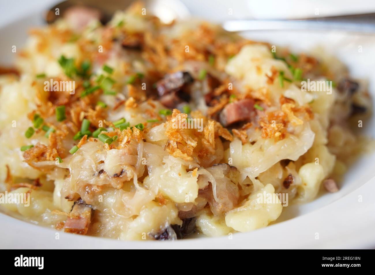 A traditional Czech dish, potato gnocchi , bacon, bacon fat and fried