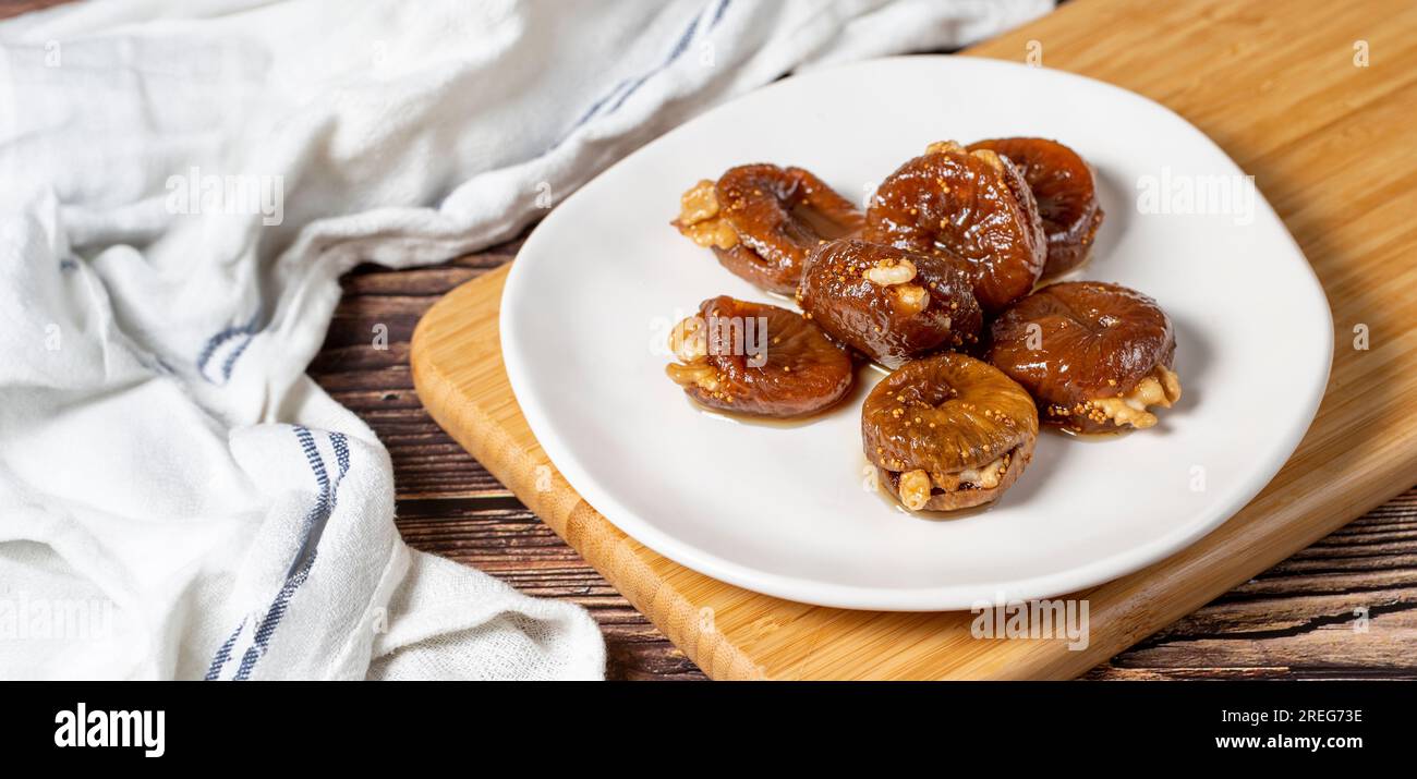 Walnut stuffed figs. Traditional Turkish sweets. Fig dessert with