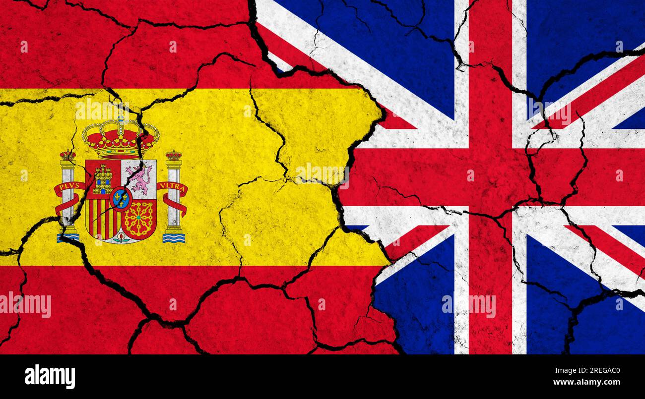 Flags of Spain and United Kingdom on cracked surface - politics ...