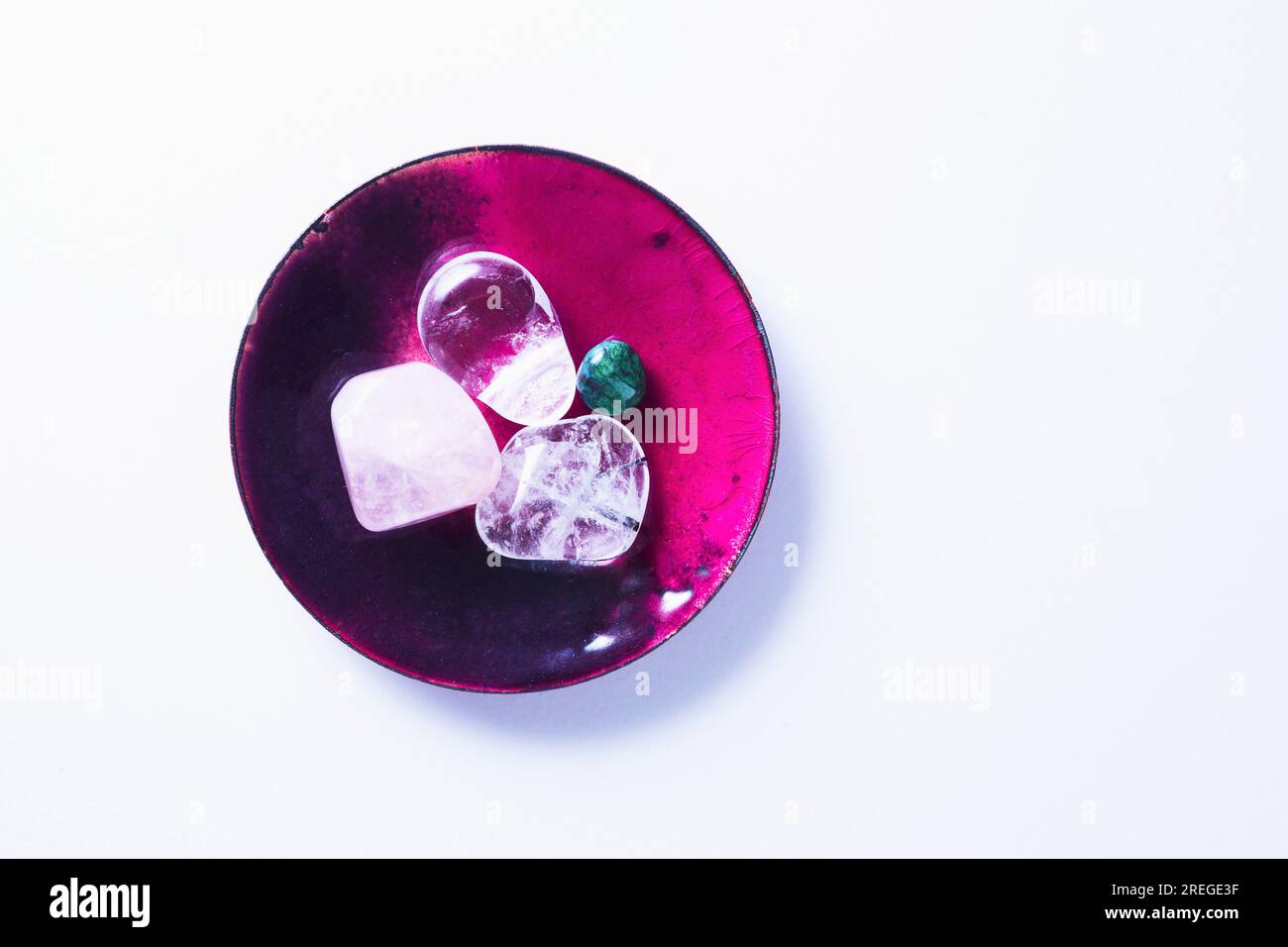Top view on several colored gems against white Stock Photo