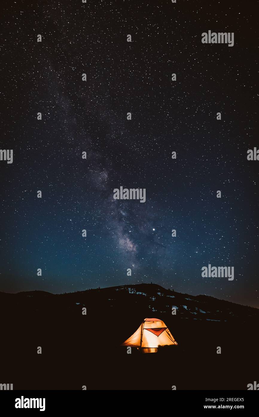glowing orange tent under a clear nights sky with milky way Stock Photo ...