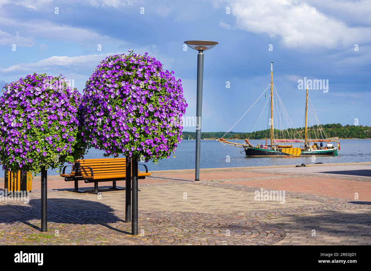 A historic twomasted sailing vessel under German flag enters the