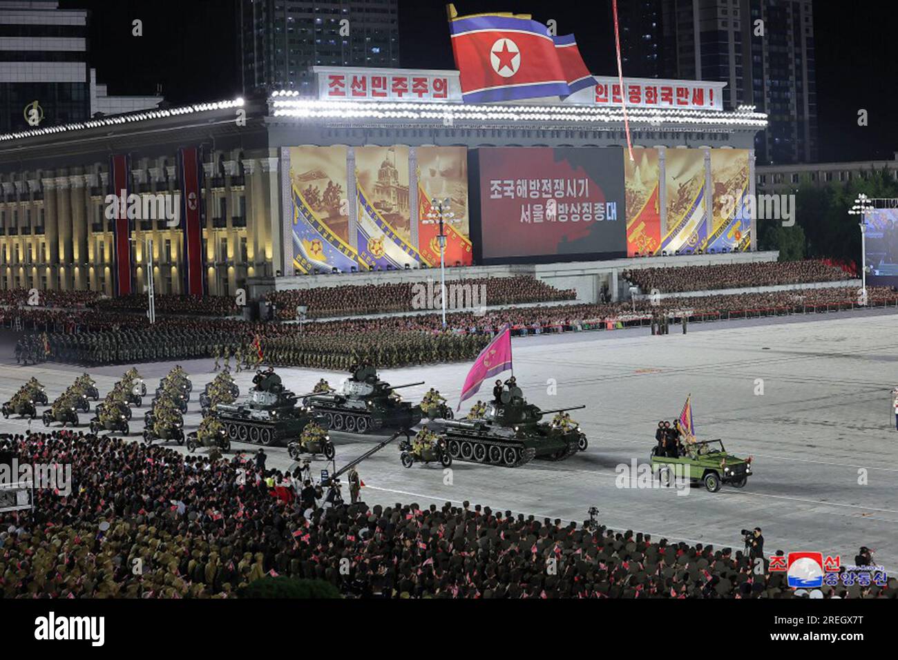 Pyongyang, North Korea. 28th July, 2023. This image released on July 28, 2023, by the North Korean Official News Service (KCNA), shows North Korean leader Kim Jong Un presiding over a military parade celebrating the 70th anniversary of the victory in the Fatherland Liberation War (Korean War) on Thursday, July 27. Present on either side of the North Korean leader were General Sergei Shoigu, Minister of Defence of the Russian Federation, and Li Hongzhong, vice-chairman of the Standing Committee of the Chinese National People's Congress. Photo by KCNA/UPI Credit: UPI/Alamy Live News Stock Photo