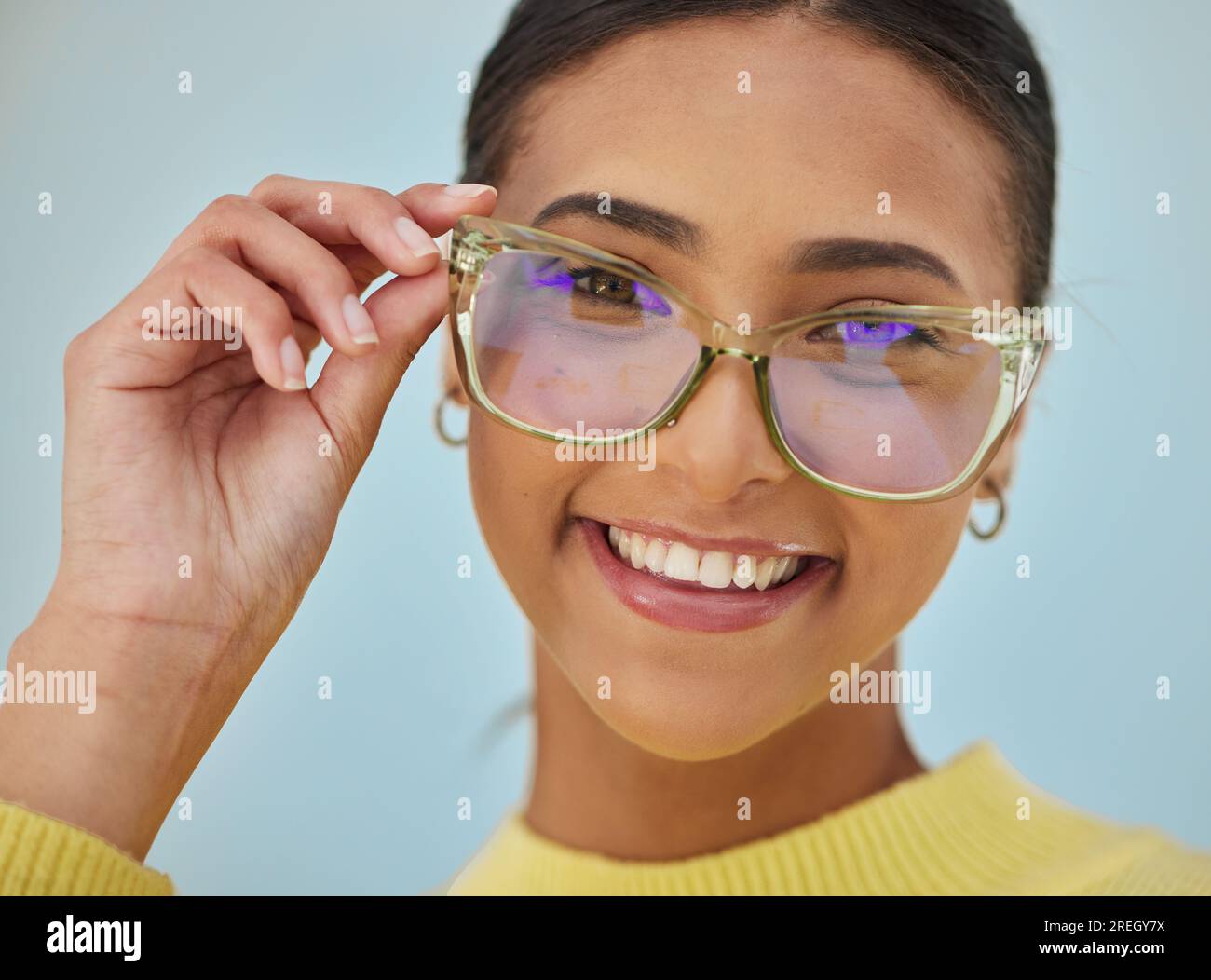 Woman portrait, glasses and vision with blue light frame with a smile