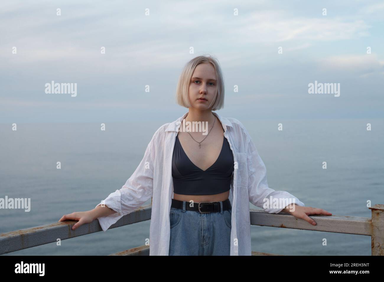 Pretty blonde beach in white hi-res stock photography and images - Alamy