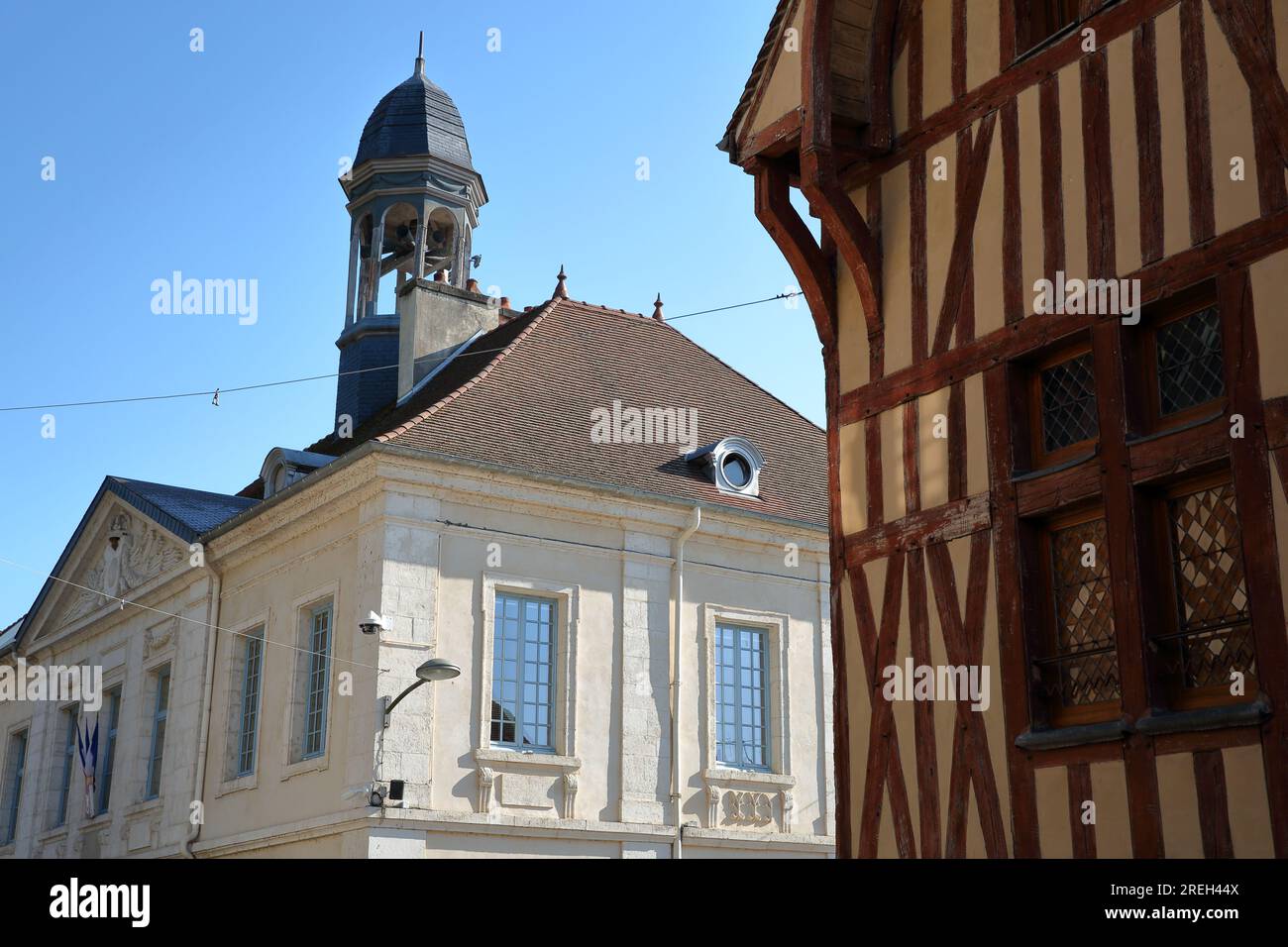 The Town Hall in Bar sur Seine, Aube, Grand Est, champagne ardenne, France, with an ancient colorful half-timbered house Stock Photo