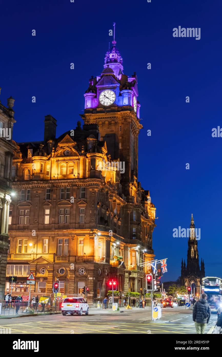The Balmoral Hotel at night in Edinburgh, Scotland, UK. Former North British Station Hotel, Victorian architecture with elements of Scots baronial, Ro Stock Photo