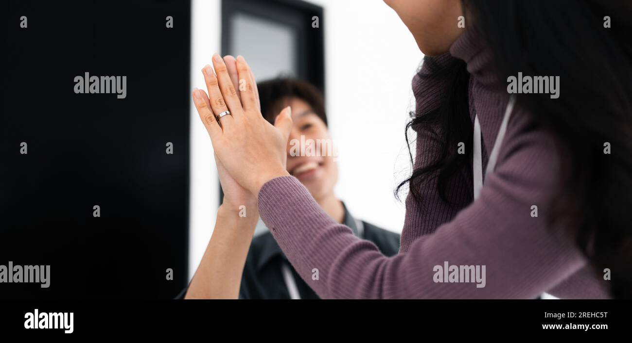 business team people give high five happy excited in teambuilding ...