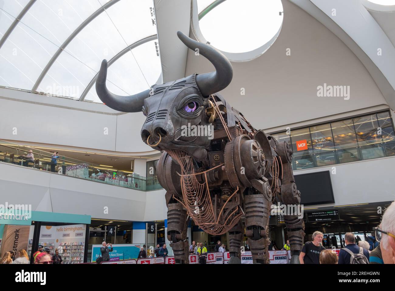 Ozzy the bull which was a feature of the Birmingham Commonwealth Games opening ceremony is now in the concourse at Birmingham New Street Station Stock Photo