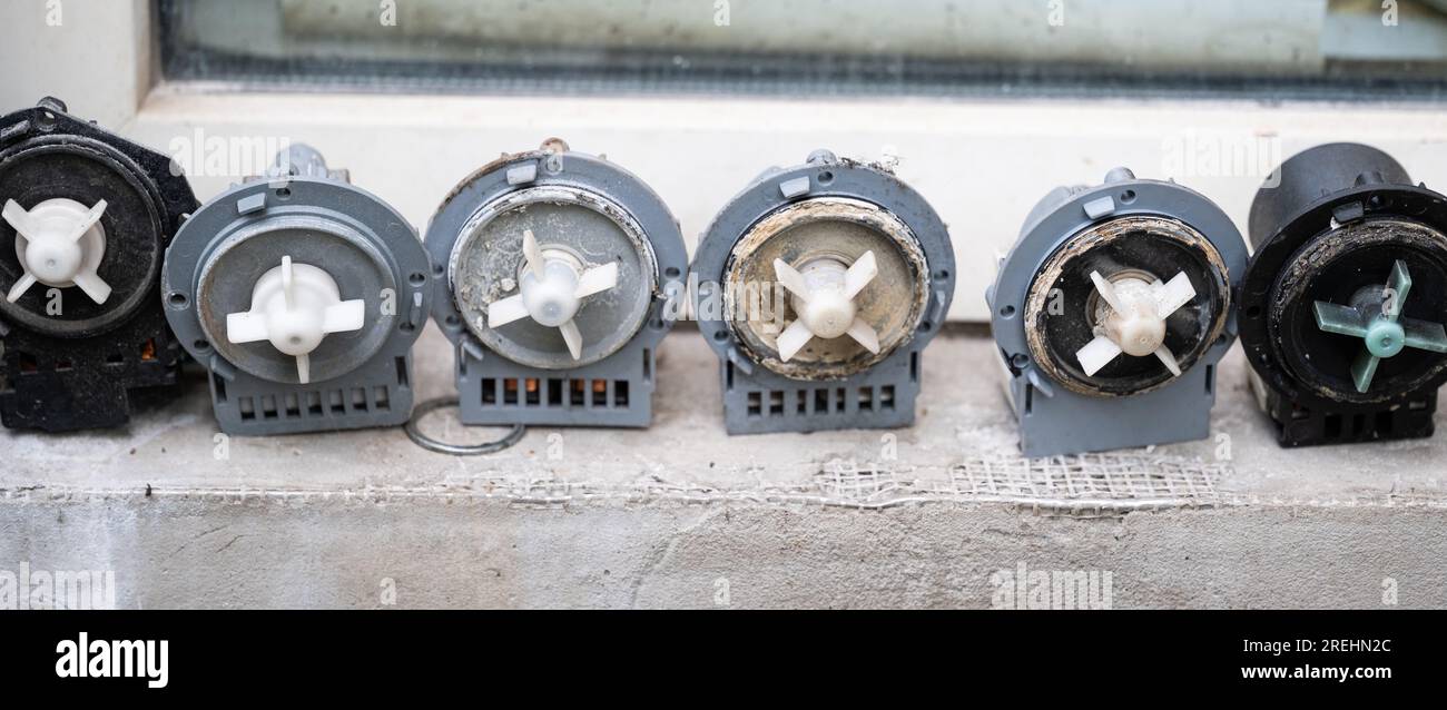 old washing machine water pumps Stock Photo Alamy